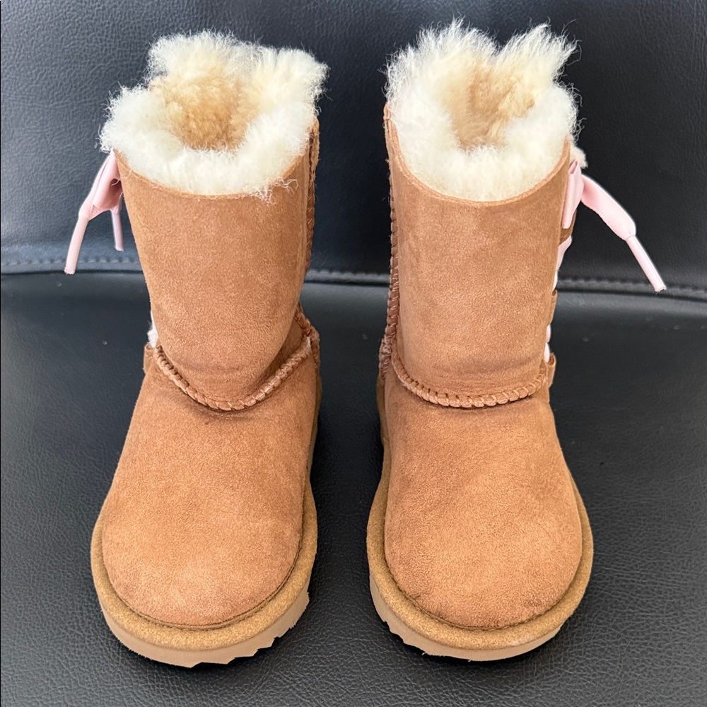 UGG Kids' Pala Boots in Chestnut Suede With Pink Ribbon Laces.